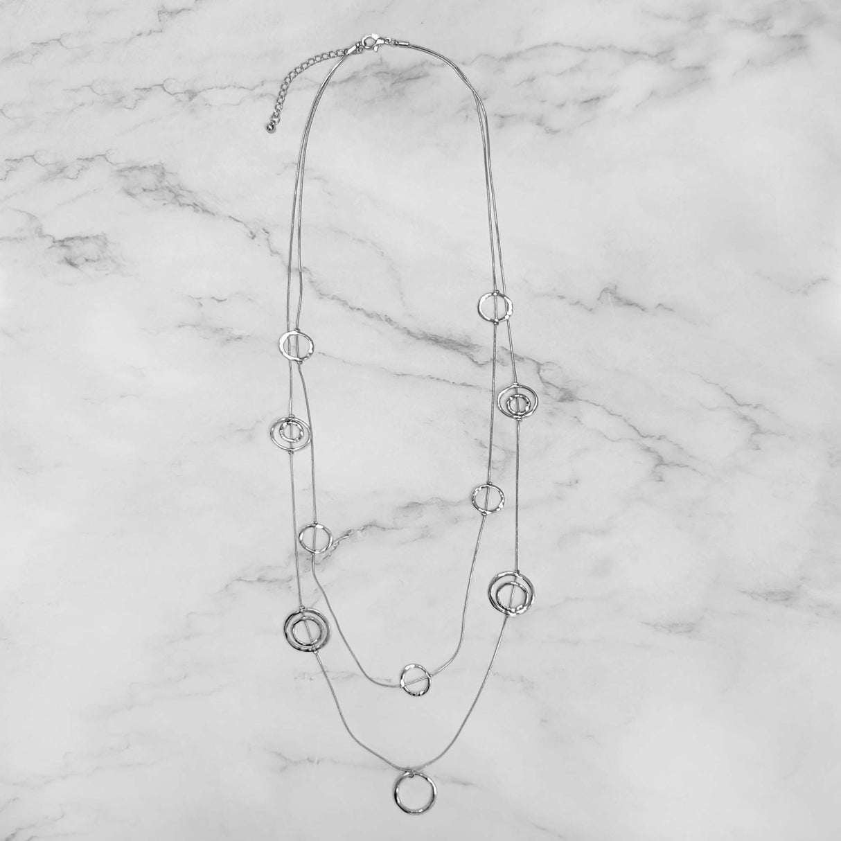 Hallow Circles In A Chain Necklace