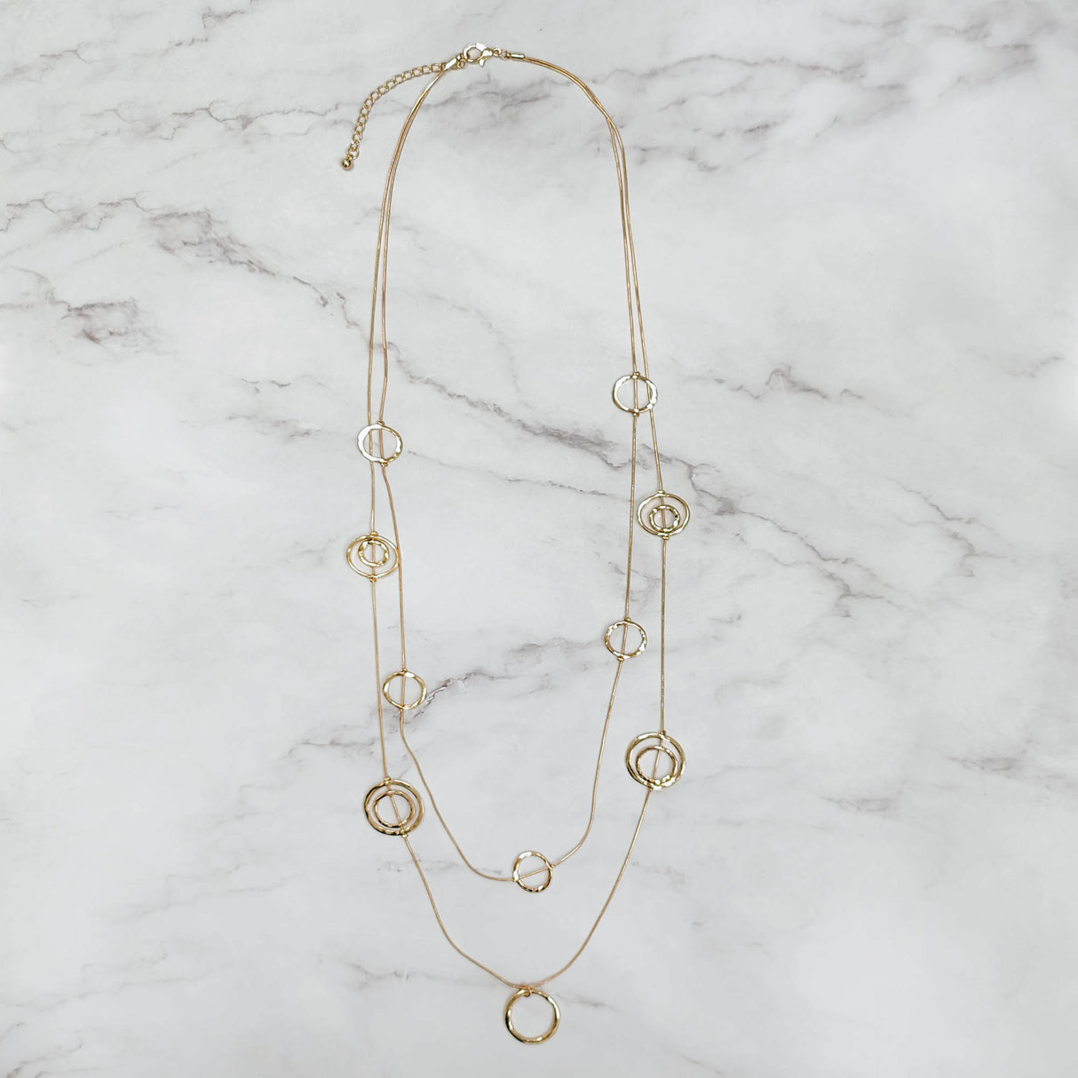 Hallow Circles In A Chain Necklace