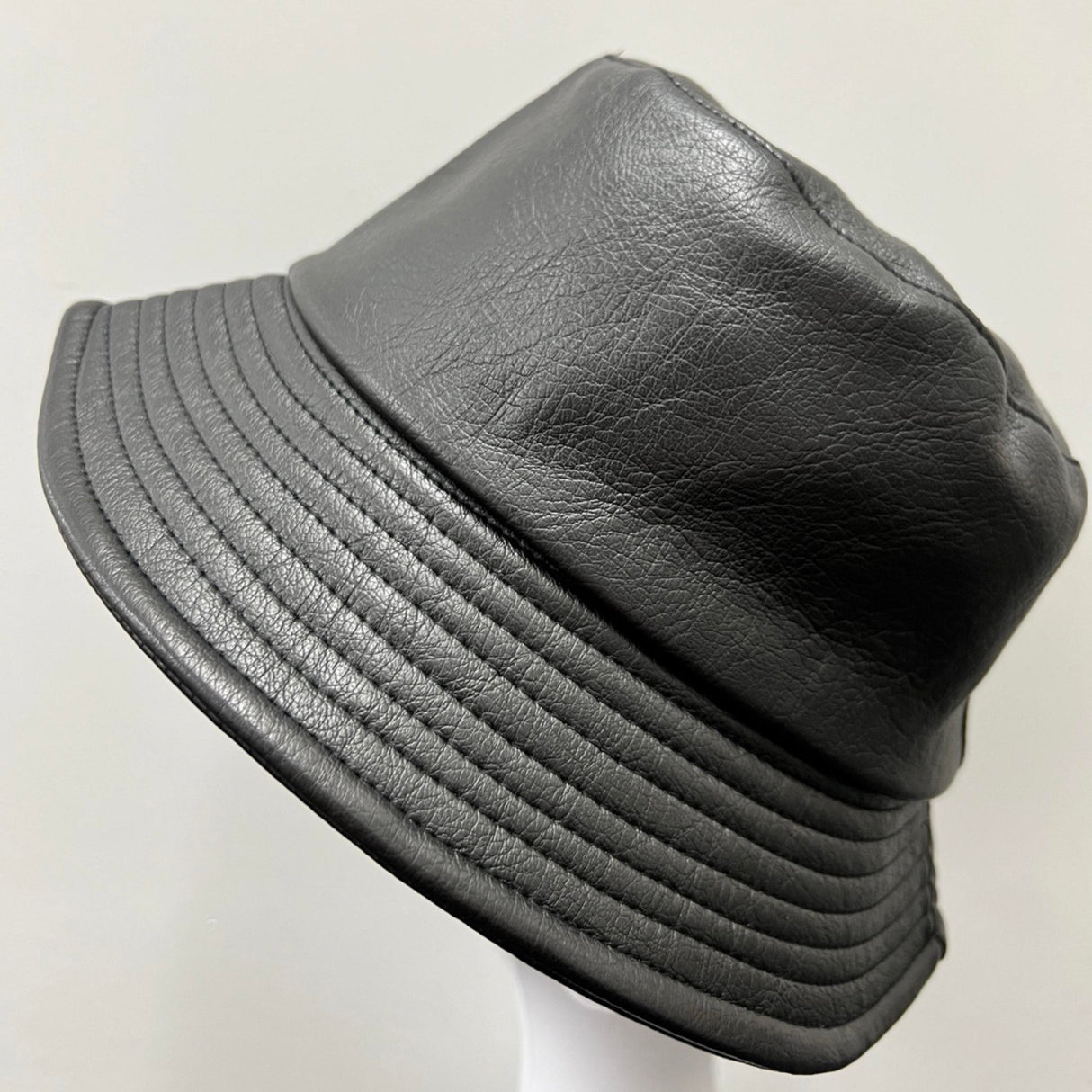 LEATHER EFFECT HATS WASHED LEATHER EFFECT HERRINGBONE