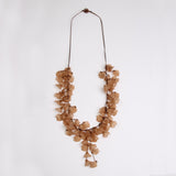 Tiny Dangling Petals In A Chord Long Necklace